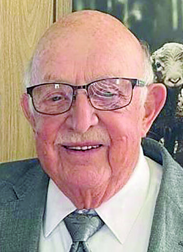 LARRY E. HELMS